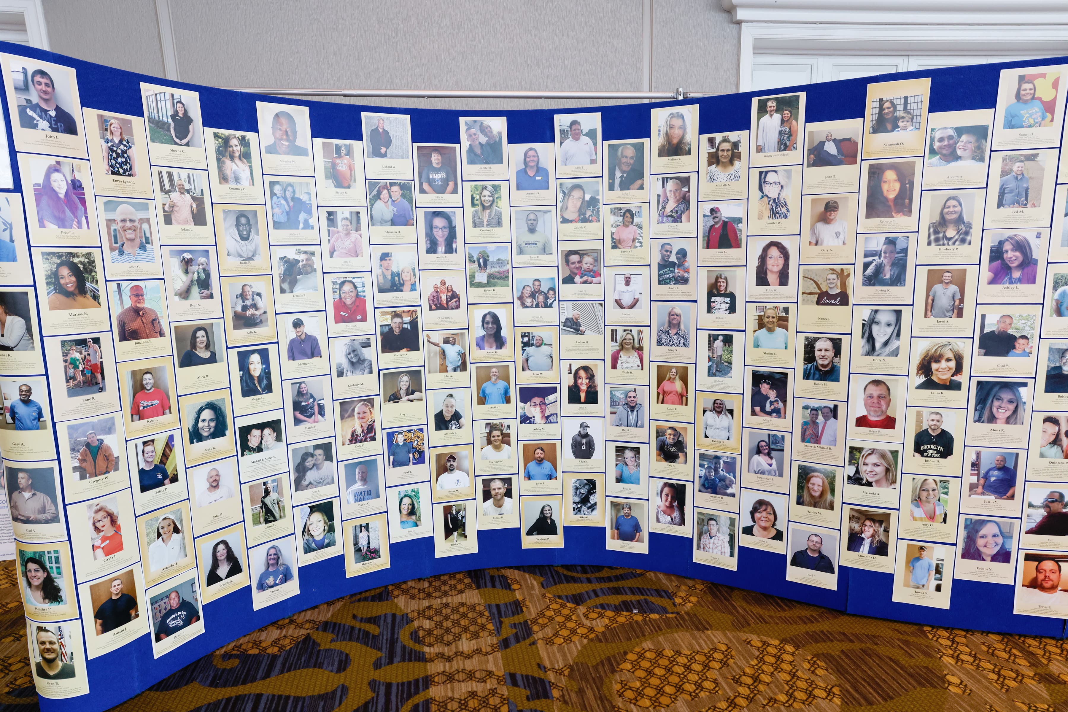 Rx Summit - Wall of photos of people recovering from opioid addiction