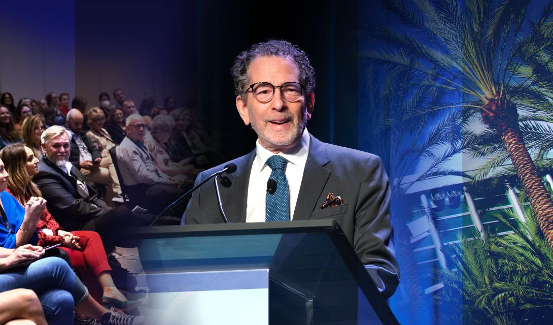 Dr. Jeffery Zeig at a lectern