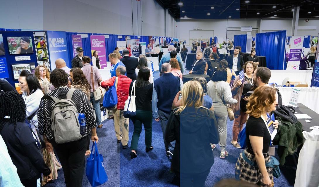 Large group of people in the Rx Summit Exhibit Hall